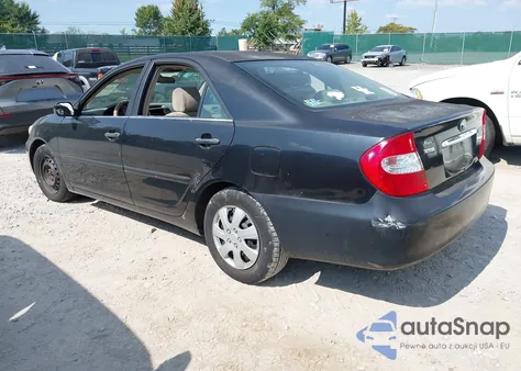 2002 Toyota Camry Le z USA, uszkodzony, nr VIN 4T1BE32K92U098012